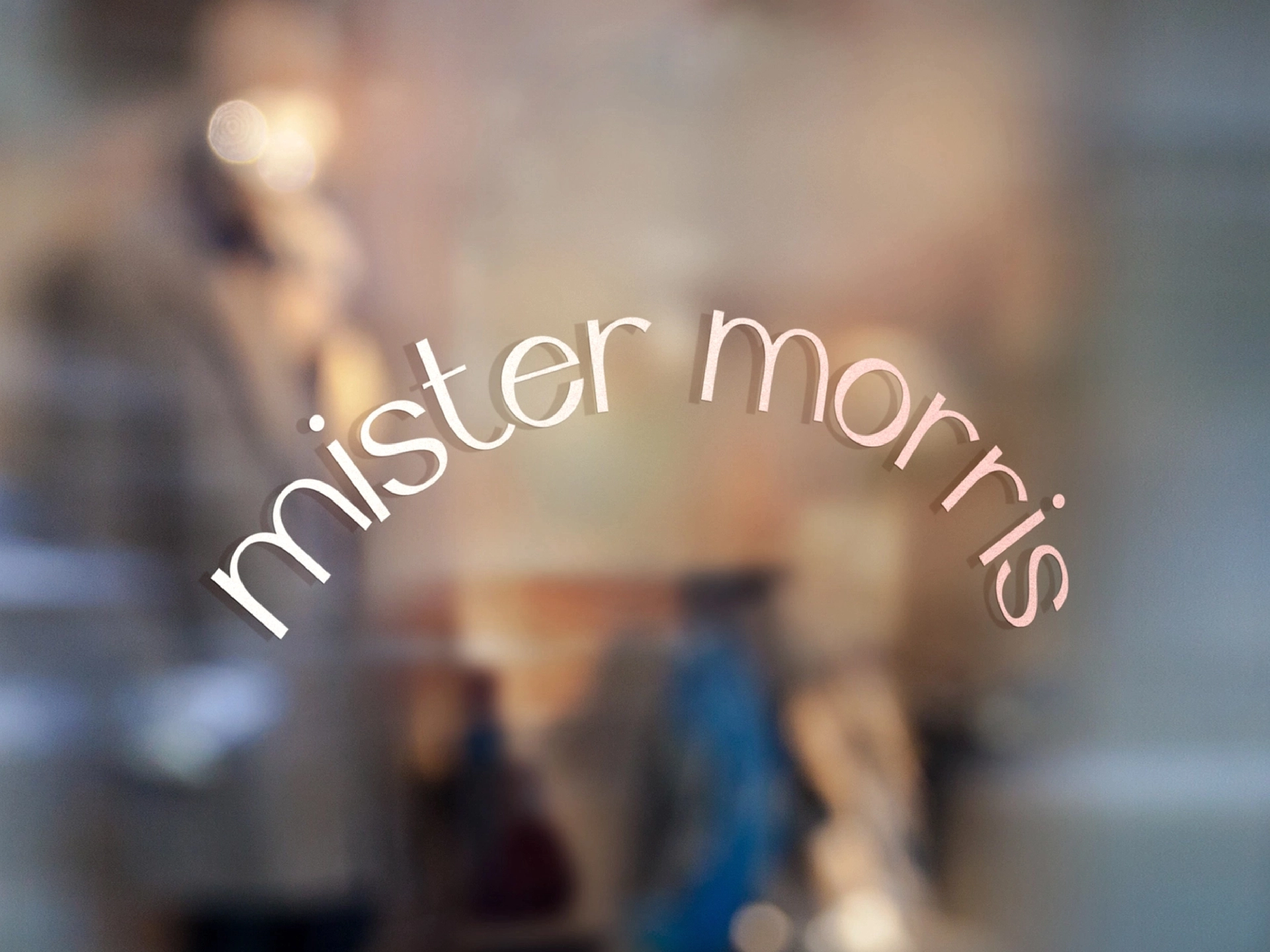 Mister Morris social logo on window